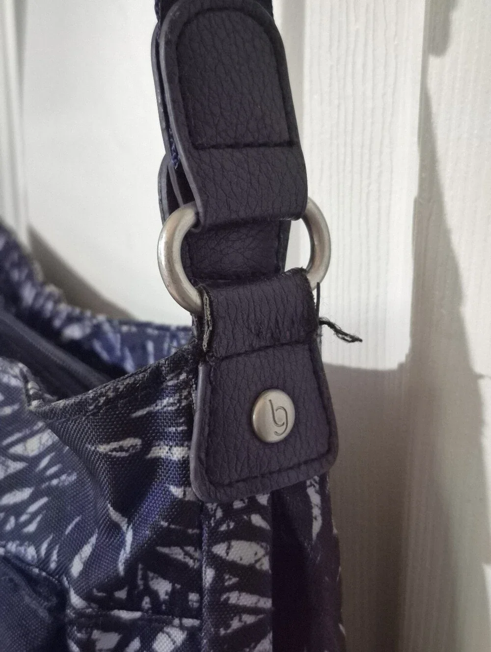 Baggalini Day trip Hobo Crossbody Bag In Navy Blue Floral